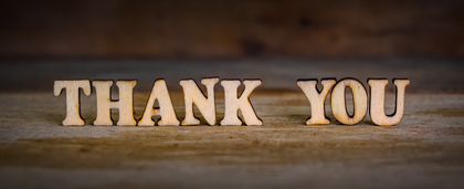 The Word Thank You Spelled Out In Wood Blocks